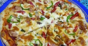 ما هي طريقة عمل عجينة البيتزا السريعة في 10 دقائق؟